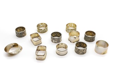 Lot 116 - Two cased silver gilt napkin rings