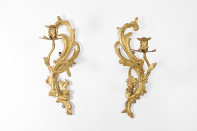 Lot 478 - A pair of George III carved giltwood wall sconces