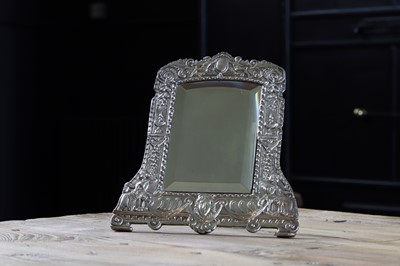 Lot 244 - A silver-mounted toilet mirror