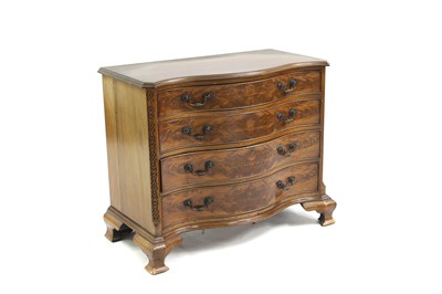 Lot 509 - A mahogany serpentine front chest of drawers