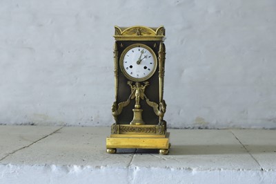 Lot 63 - A French Empire ormolu cased mantel clock