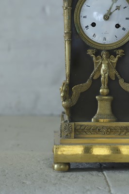 Lot 63 - A French Empire ormolu cased mantel clock