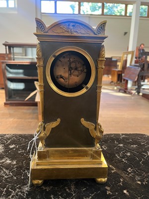 Lot 63 - A French Empire ormolu cased mantel clock