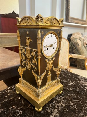 Lot 63 - A French Empire ormolu cased mantel clock