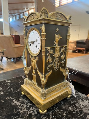 Lot 63 - A French Empire ormolu cased mantel clock