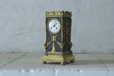 Lot 63 - A French Empire ormolu cased mantel clock