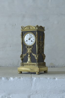 Lot 63 - A French Empire ormolu cased mantel clock