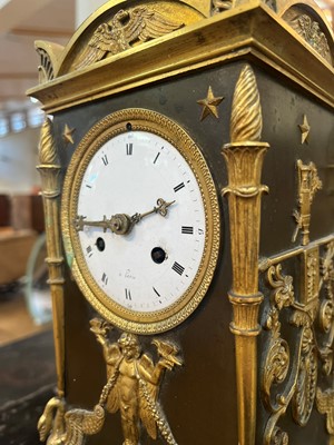 Lot 63 - A French Empire ormolu cased mantel clock