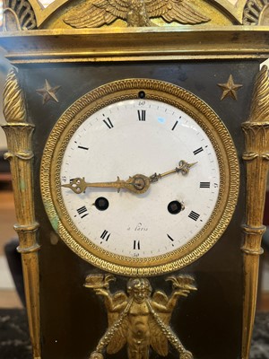 Lot 63 - A French Empire ormolu cased mantel clock