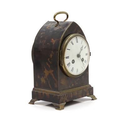 Lot 214 - A tortoiseshell mantel clock