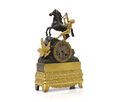 Lot 211 - A French gilt metal mantel clock