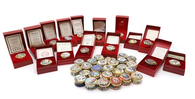 Lot 239 - A collection of Halcyon Days enamel Christmas pill boxes