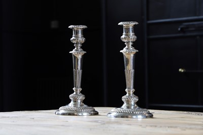 Lot 231 - A pair of George IV silver candlesticks