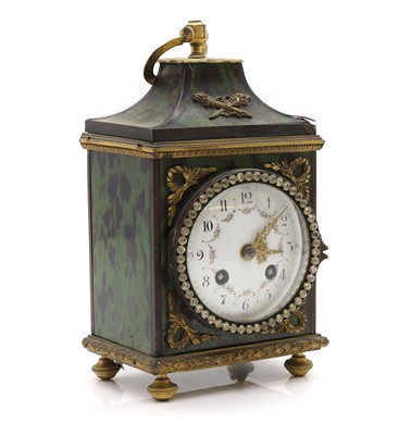 Lot 210 - A green tortoiseshell clock