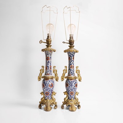 Lot 387 - A pair of Chinese blue and white porcelain table lamps