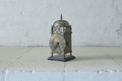 Lot 174 - A 17th-century-style brass cased lantern timepiece