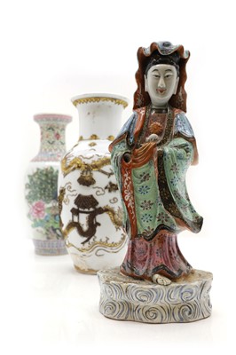 Lot 177 - A Chinese famille rose figure