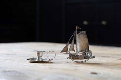 Lot 240 - A miniature silver yacht