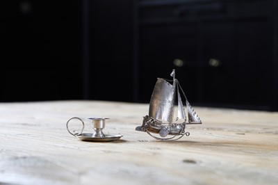 Lot 240 - A miniature silver yacht