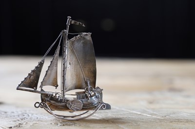 Lot 240 - A miniature silver yacht