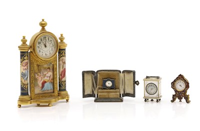 Lot 221 - A French gilt metal boudoir clock