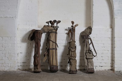 Lot 372 - Two sets of pre-war canvas and leather golf bags and clubs