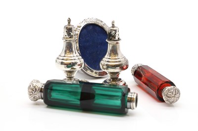 Lot 60 - A near pair of Victorian glass and silver-plated scent bottles