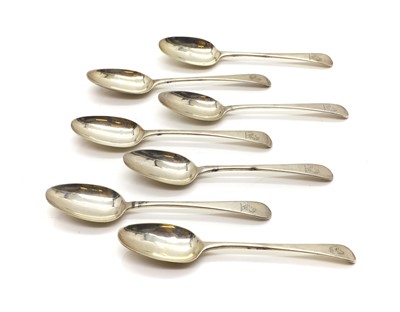 Lot 92 - A composed set of seven George III silver Old English pattern tablespoons