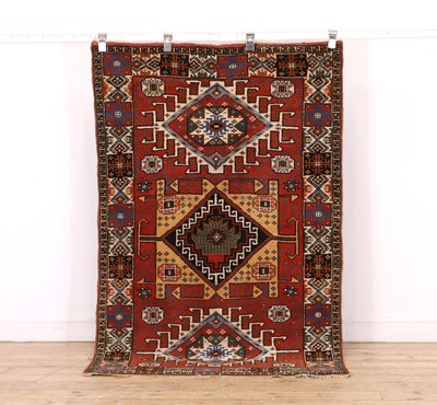 Lot 420 - A tribal wool rug