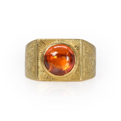 Lot 34A - A gentlemen's orange paste signet ring