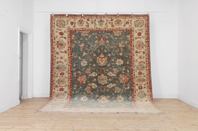 Lot 248 - A large Oushak wool carpet