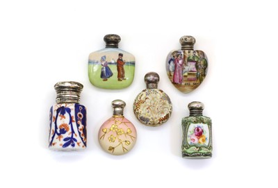 Lot 118 - A group of six silver mounted porcelain scent bottles