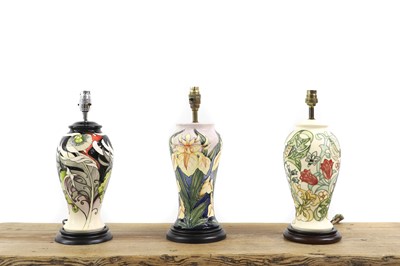 Lot 237 - A group of three Moorcroft pottery lamps