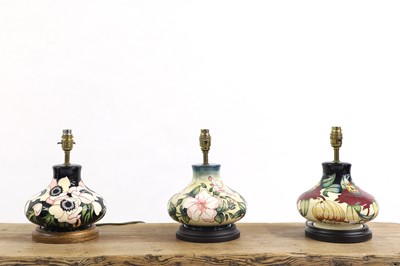 Lot 225 - Three Moorcroft pottery lamps