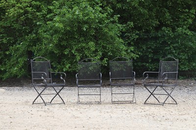 Lot 687 - A set of four metal garden chairs