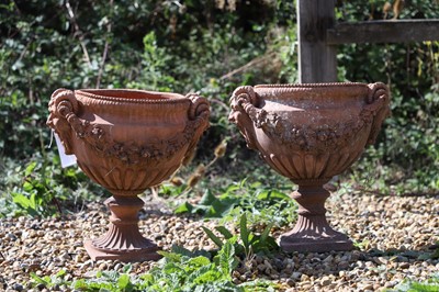 Lot 720 - Two terracotta garden urns