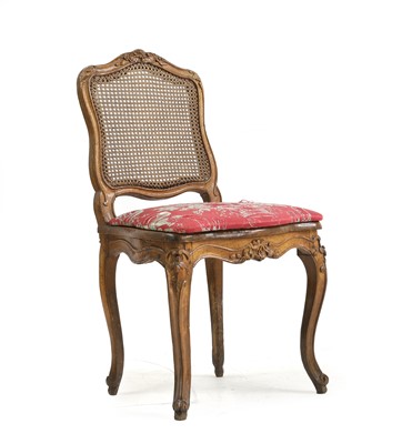 Lot 515 - A provincial Louis XV beechwood and cane chair