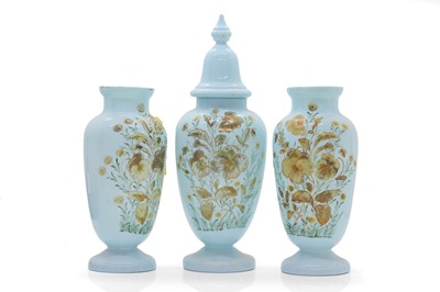 Lot 153 - A set of three continental opaque blue glass vases