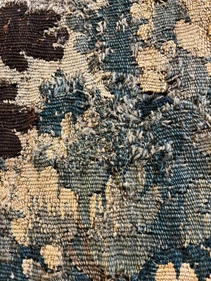 Lot 585 - A verdure tapestry fragment