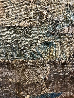 Lot 585 - A verdure tapestry fragment