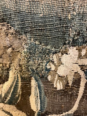 Lot 585 - A verdure tapestry fragment