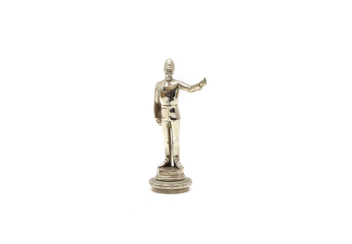 Lot 8 - A standing policeman radiator mascot