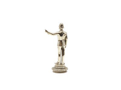 Lot 8 - A standing policeman radiator mascot