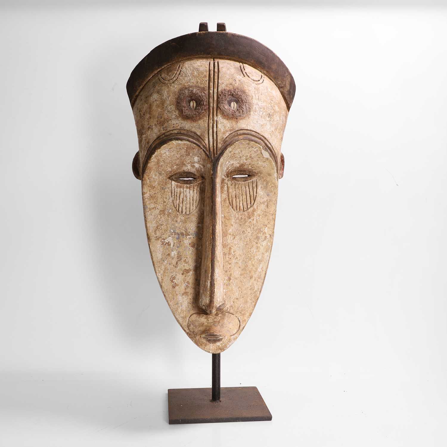 Lot 179 - A large painted Ngil-type mask
