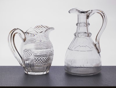 Lot 232 - A collection of cut glass water jugs