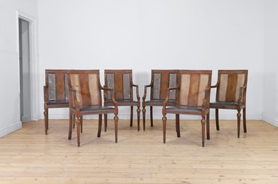 Lot 52 - A set of six oak and cane elbow chairs