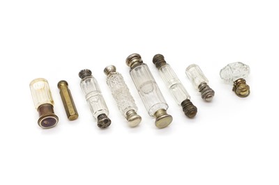 Lot 117 - A group of cut glass scent bottles