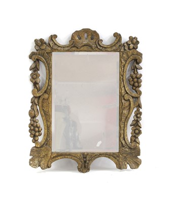 Lot 346 - A carved giltwood rococo mirror