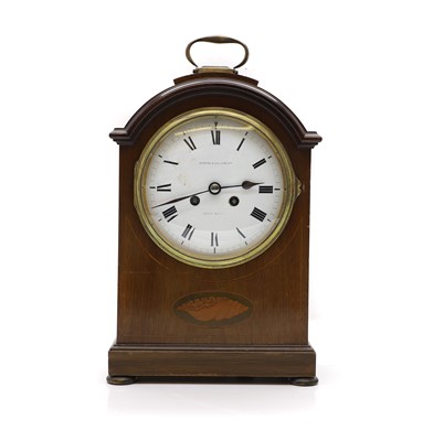 Lot 241 - A Waring & Gillow mahogany mantel clock