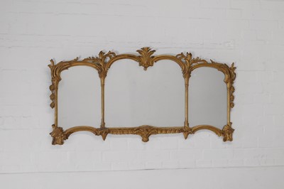 Lot 44 - A George III-style carved giltwood overmantel mirror